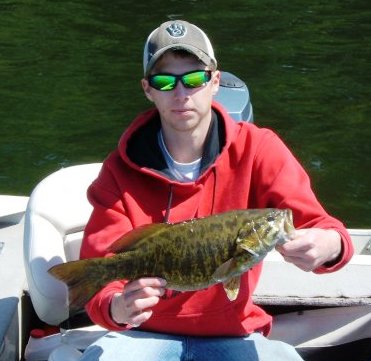 The color and vertical banding patterns of a smallmouth bass; photo courtesy of fellow angler and friend Jake Thompson