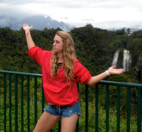 Me holding the waterfall and the clouds!