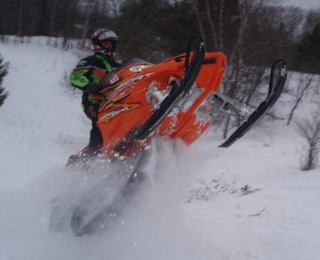 Colin Natrop on a snowmobile. Photo courtsey of me.