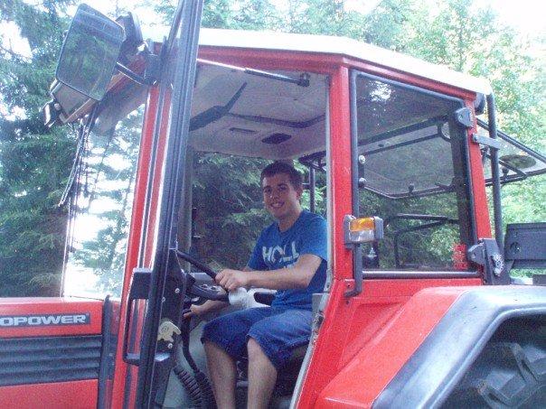 Colin Natrop driving a tractor in Germany. Photo courtsey of me.