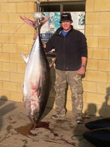 A happy fisherman with his Bluefin