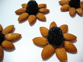 Almond and Blackberry design.  http://www.flickr.com/photos/piperkinsvater/3253563696/sizes/o/