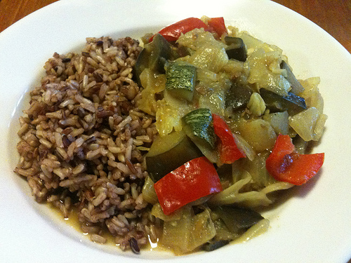 Image shows a wild rice dish with rice and vegetables.