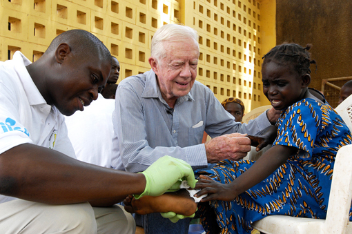 President Carter Comforting a Guinea Worm Disease Patient